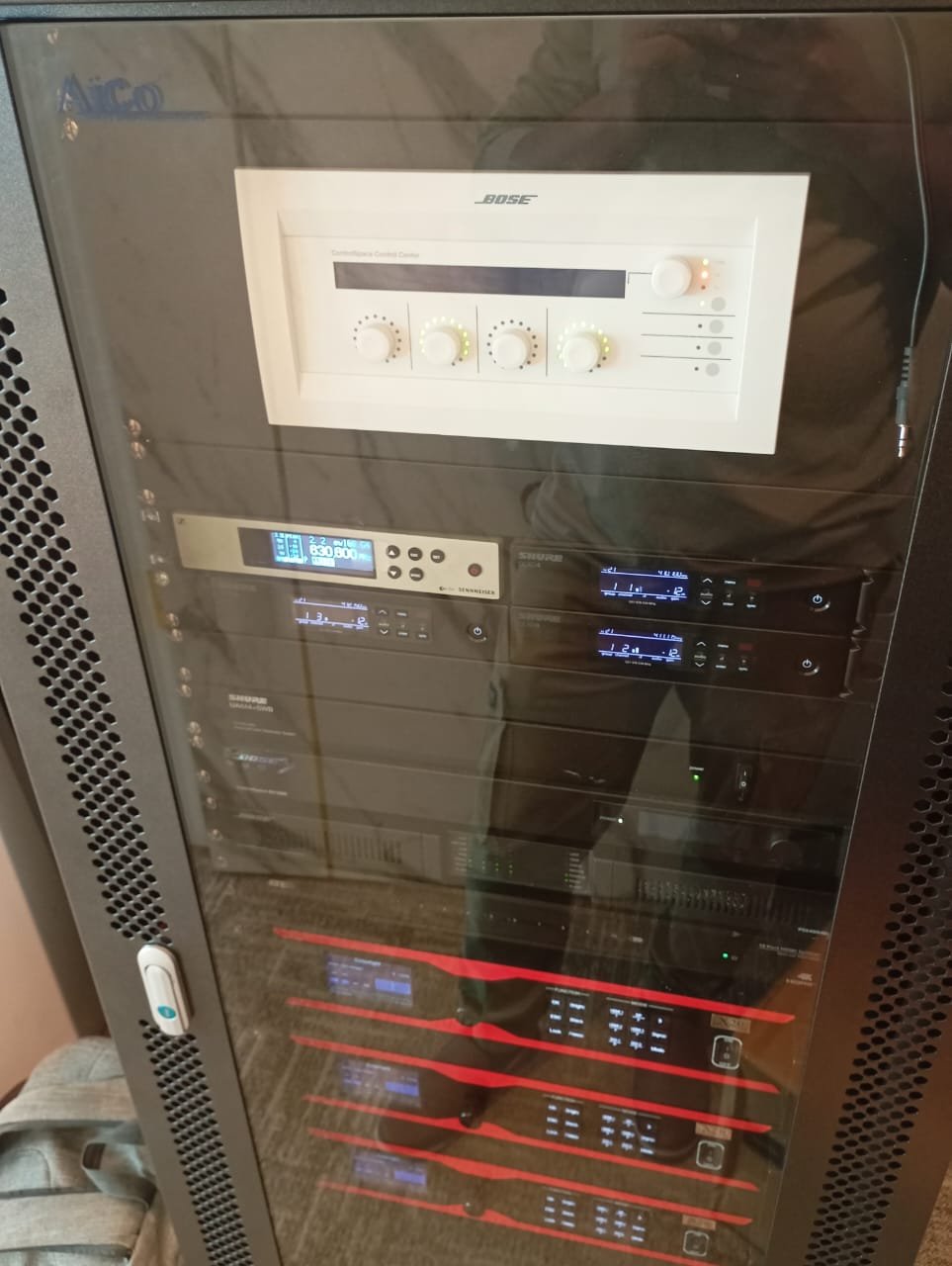 Professional audio visual AV system installation — BOSE Sennheiser Shure amplifier rack UAE